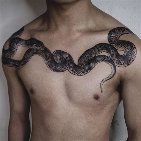 snake chest tattoo designs.